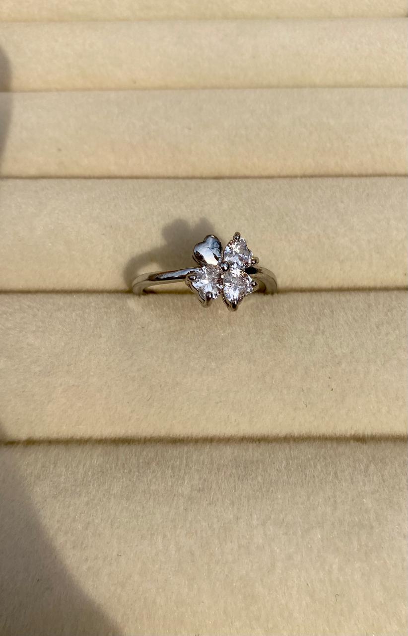 The Floral Pearl SolitaireLuminous Bloom Four-Petal Pearl & Pavé Floral Ring