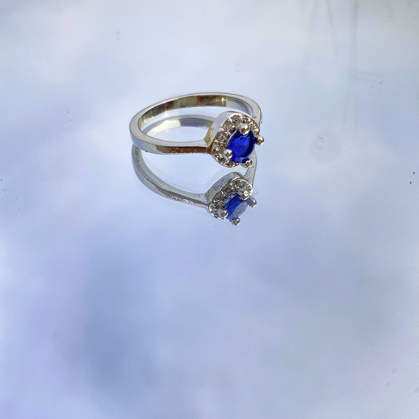 Sapphire Radiance: Brilliant Blue & lavender Halo Statement Ring